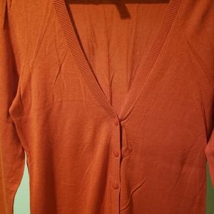 Four, different colours sweaters